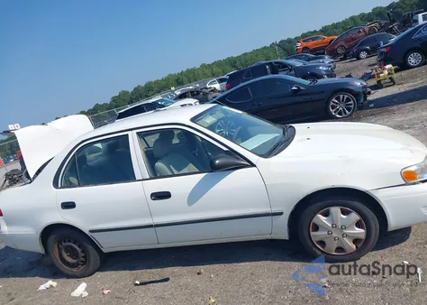 2000 Toyota Corolla Ce z USA, uszkodzony, nr VIN 2T1BR12E6YC342194